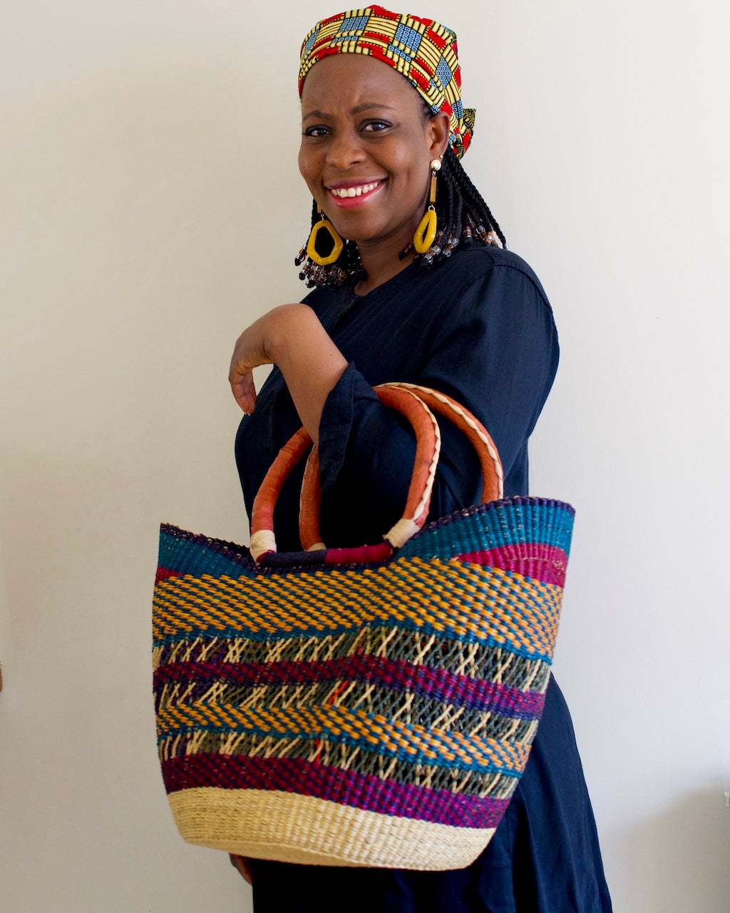 woman holding a basket tote bag