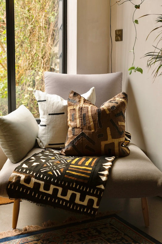 Kuba and Bogolan fabric on a sofa